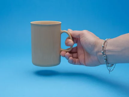 Slip casting plaster mold for an elegant tall mug with a handle
